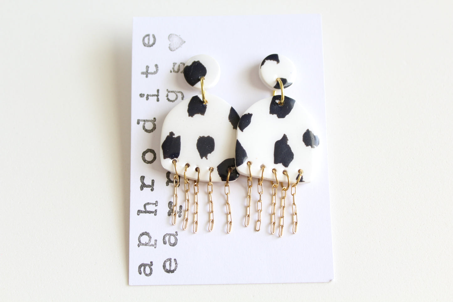 clay earrings | cow