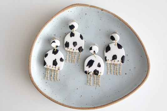 clay earrings | cow