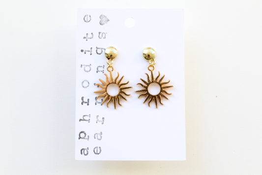 gold sun charm earrings